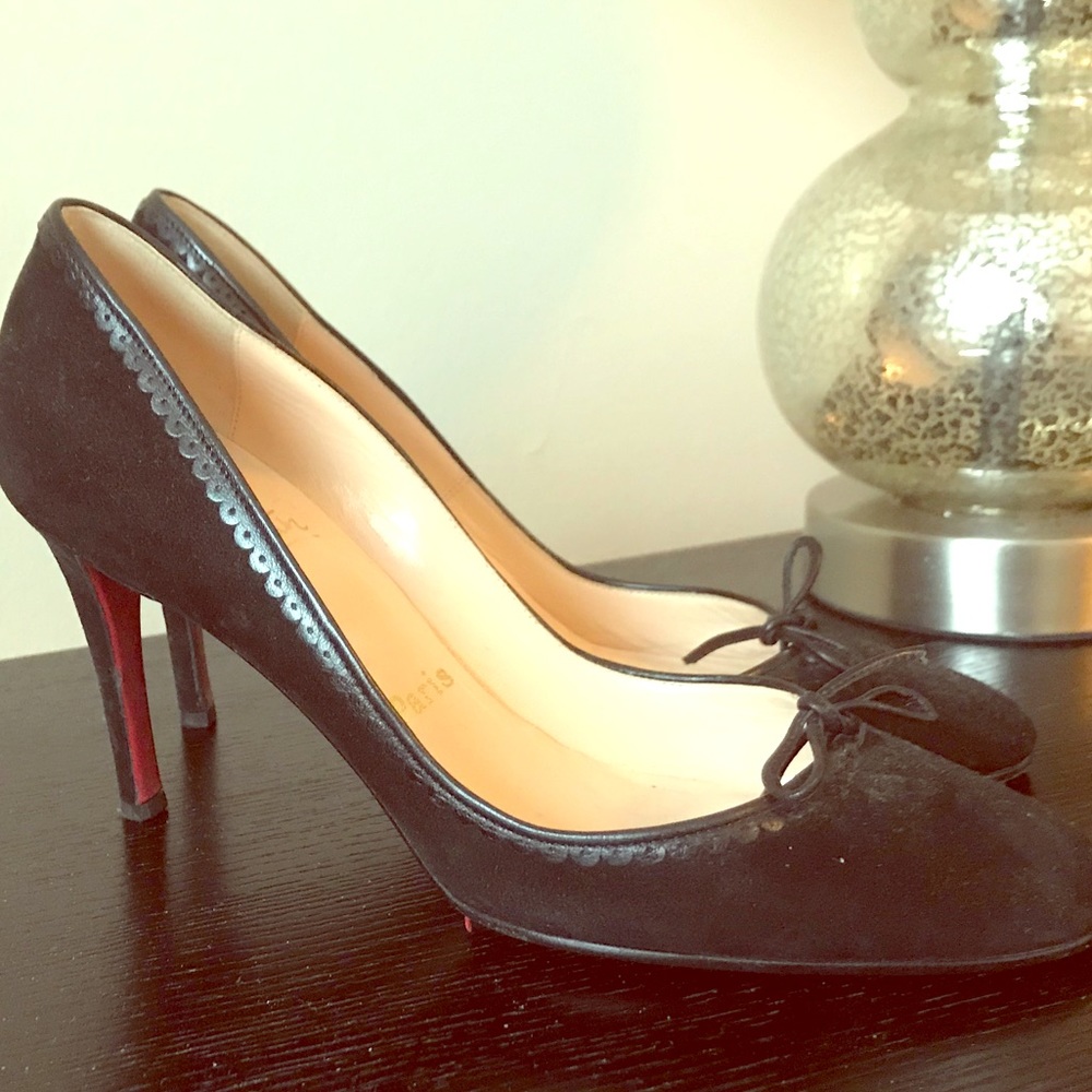 Christian Louboutin black suede 3 inch heel pumps.